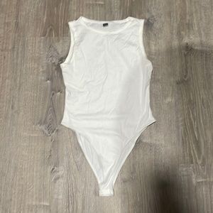 QTY 2. White high neck tank top body suit. Never worn